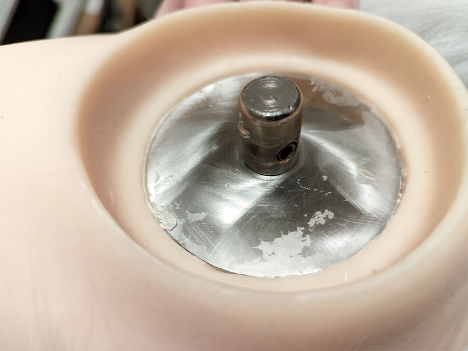 Completed head stand with doll head